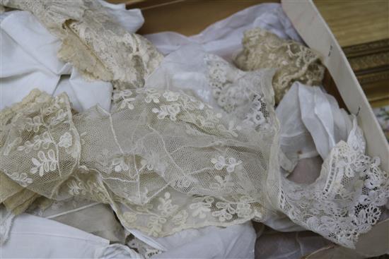 A 1920s lace wedding dress together with a collection of lace and white work and a lace bonnet